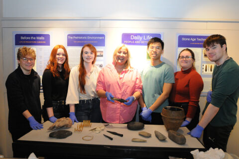 Dr Caroline Pudney and archaeology students from the University of Chester at Chester's Grosvenor Museum